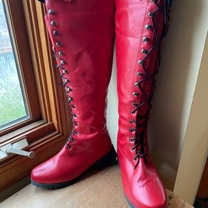 Red Equestrian boots with side zipper. Size 39. Never used